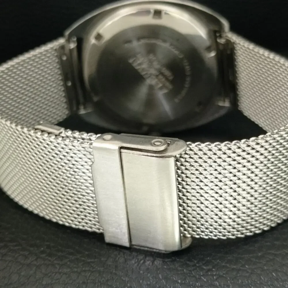 Vintage 1976 Allwyn Manual Mens Silver Watch W/Steel Strap & Gold accents